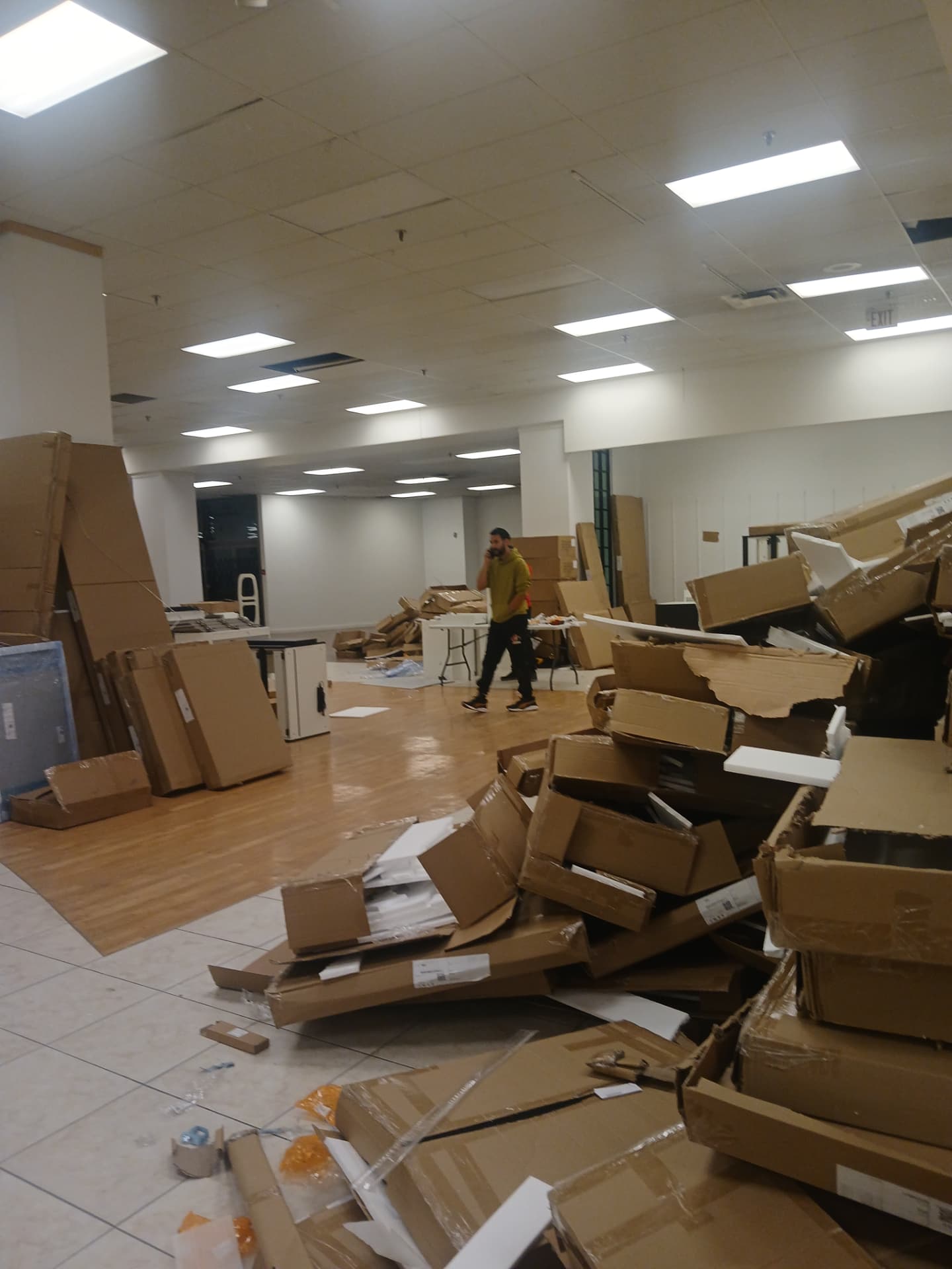 Unpacked components and packaging in the work area